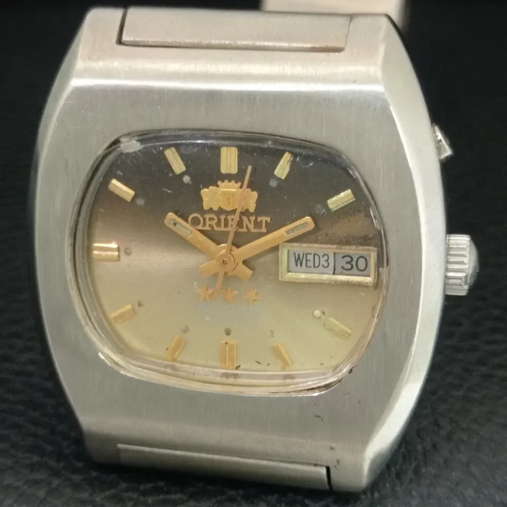 Vintage 1973 Orient Manual Mens Silver Watch W/daydate & Gold accents